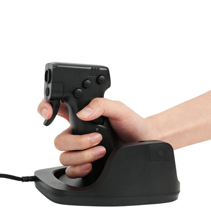 Hand holding a gun-shaped mouse with charging base on a white background, featuring 'Gun Mouse L25A' text.